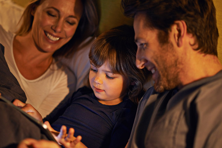 Parent sharing a bedtime story with their child